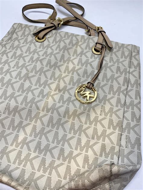 michael kors purse discoloration|michael kors plastic tote bag.